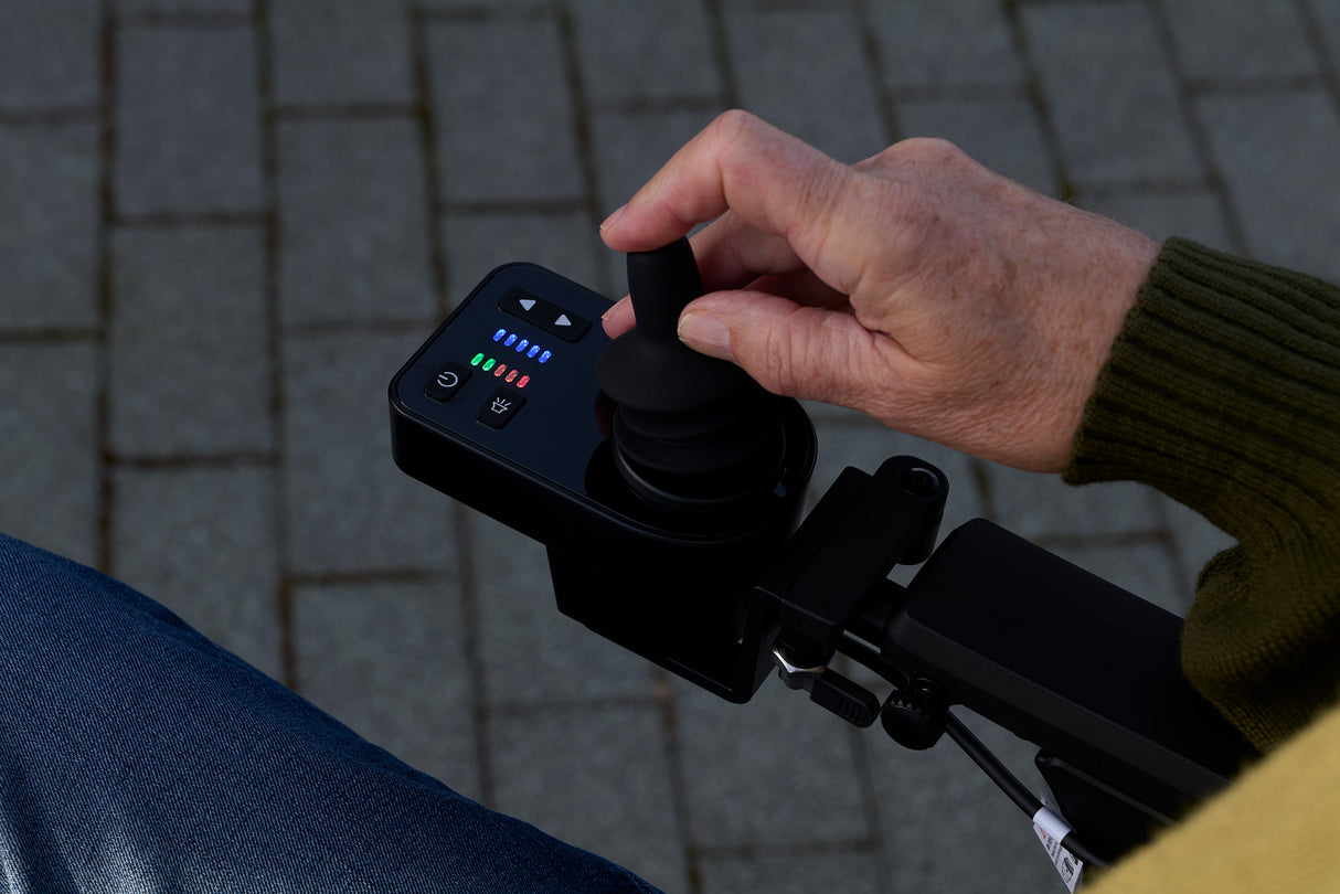 Motion Healthcare Electron Powerchair. Built for Life on the Move. Ultra Light & Compact Magnesium Frame At Just 11.7kg!